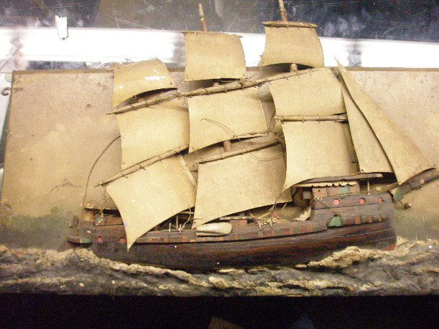 Clipper Ship Carved Relief Panel: Clipper ship carved relief panel with poly-chrome decoration, early 20th c. [sails are shaped metal]. 25"=length (panel).