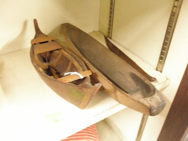 Vintage Canoe and Chinese Fishing Boat Models: [2] Vintage wood Oriental canoe; Chinese fishing boat models, early 20th c. 15"=(canoe length); 12"=(length boat). Provenance: From the collection of the former Commercial Museum, Philadelphia (later 