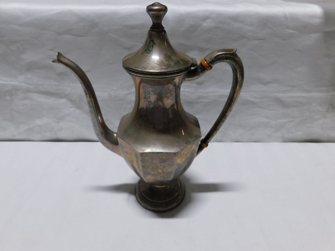 Sterling Coffee Pot: Sterling Coffee Pot, by PSCO, #715, paneled Federal style on circular foot, 10 1/2"h, 8"l, 14.30 ozts. CONDITION: Very fine. Tarnished.