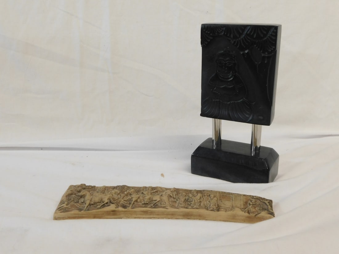 Chinese Buddha Panel: Chinese Buddha Panel, slate, slate panel relief carving of Buddha under a tree, supported on two chromed rods and slate base, 4" x 7 1/2" x 2" and an ivorine cast panel of Chinese life scene, 9 1/4" x