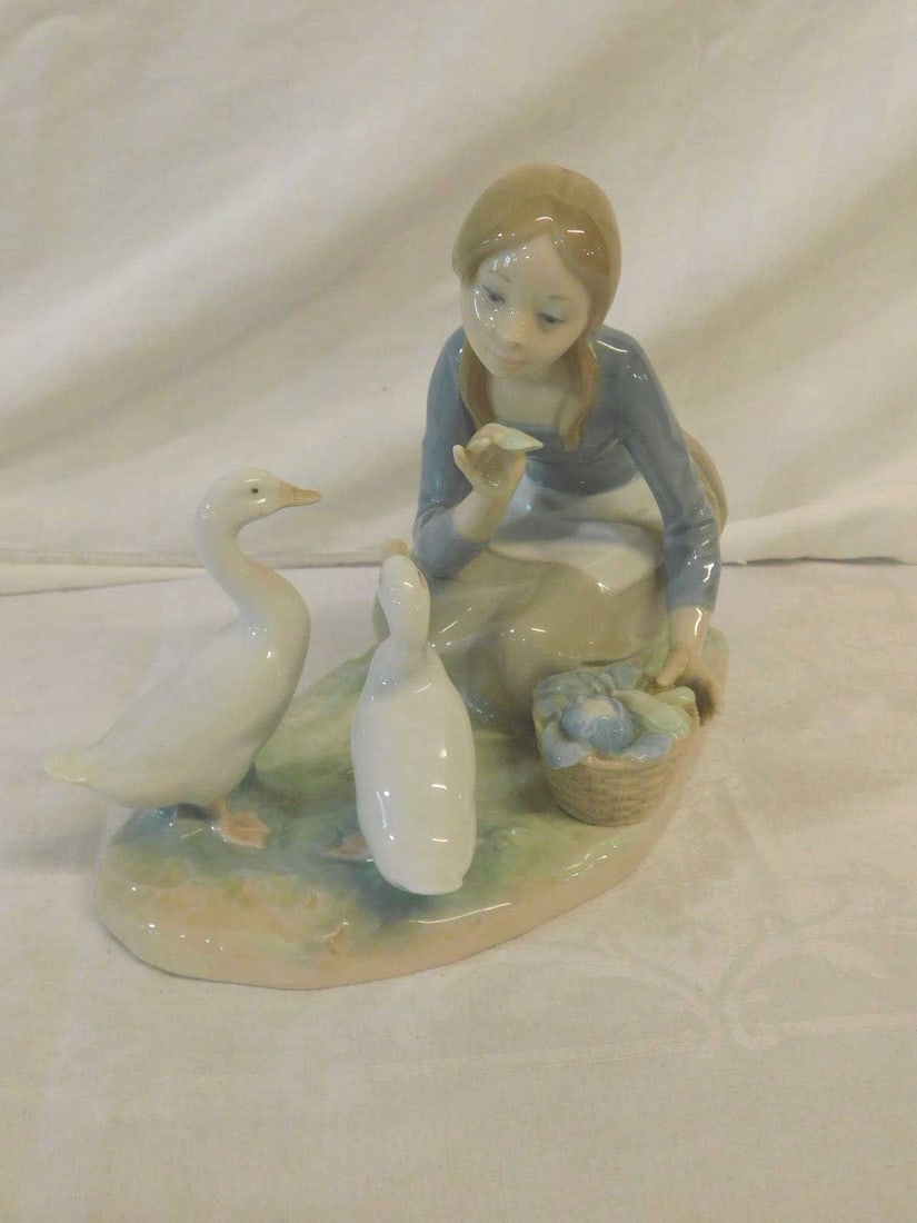 Lladro Figure: Lladro Figure, feeding the ducks, No. 4849, 6 3/4"h,9"l. CONDITION: Very fine.