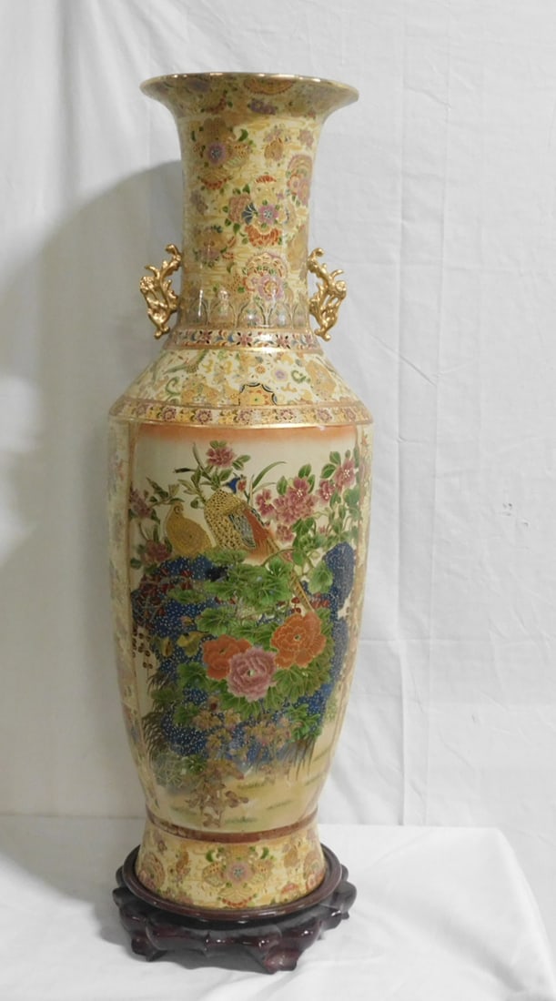Chinese Palace Vase: Chinese Palace Vase, porcelain, overall gold & multi colored floral, designs & borders with pheasants in garden painted panels, fitted wood base, late 20th c. H 36". CONDITION: Very fine.