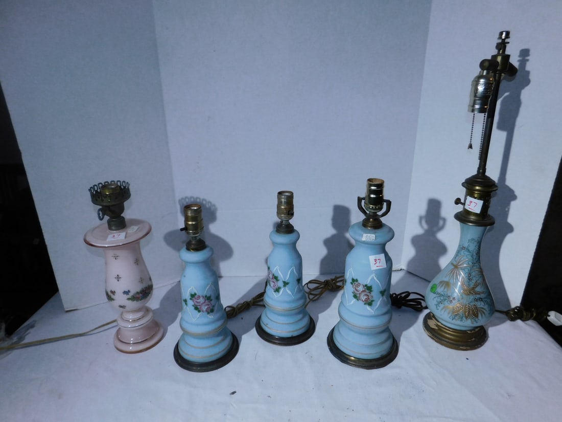 5 Bristol glass lamps: 5 Bristol glass lamps , with floral painted designs in blue and pink, various sizes, tallest 24" h. Condition: some brass tarnish