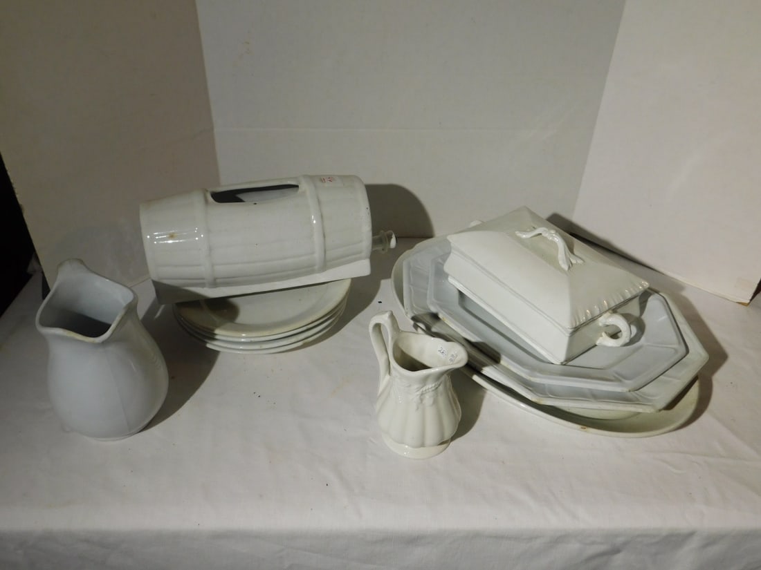 Ironstone lot: Ironstone lot including: water casket, barrel form, pitchers, covered vegetable, plates, platters and two covered sugars. Condition: good, minor wear