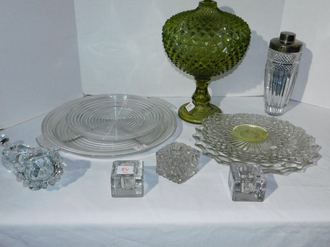 Assorted glassware: Assorted glassware including: 14" green saw tooth covered compote, molded glass cocktail shaker, assorted round trays, 3 inkwells (no tops), etc. Condition: good