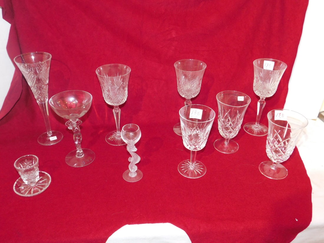 Waterford & Other Crystal: Waterford and Other Crystal, includes: seven Waterford goblets from 7" to 10 1/4", an unmarked toothpick holder; 6" seahorse goblet and female nude 7 1/2" champagne goblet. CONDITION: Very good.