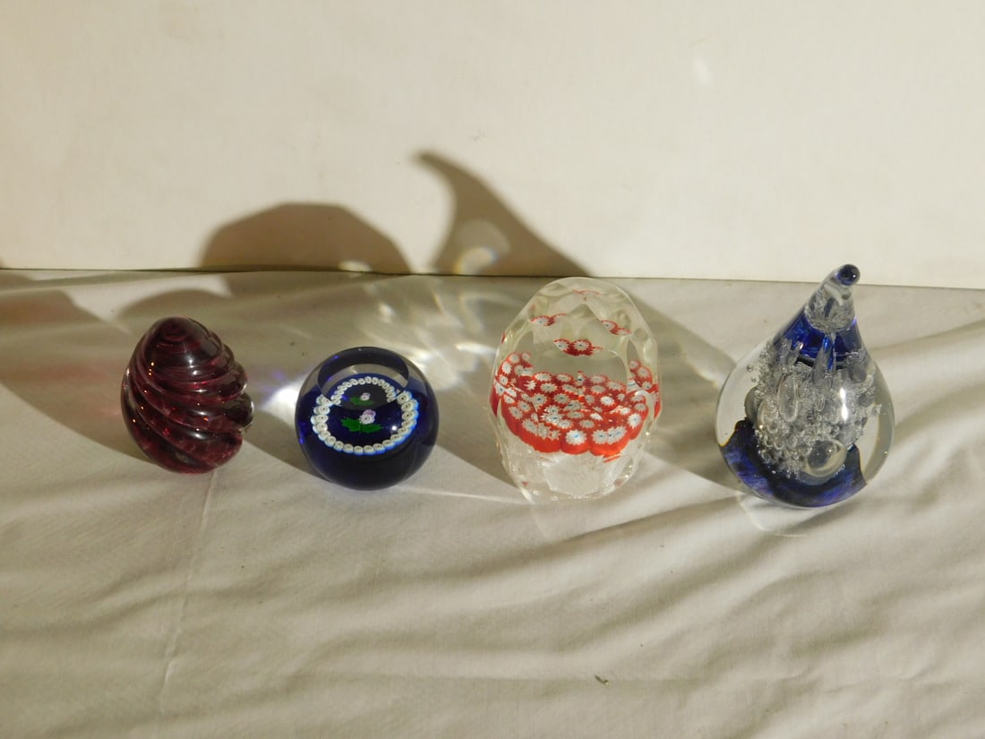 4 Glass Paperweights, signed and other: Four Glass Paperweights, signed and other, includes: artist signed Caithness Millefiori; "OBG - 1993" signed amber glass swirled egg; unsigned faceted egg form Millefiori and a Polish labeled and etch