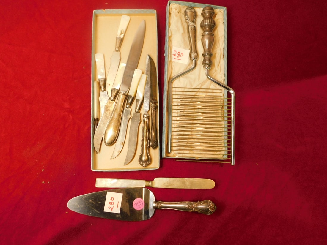 Sterling Handle, etc. Flatware: Sterling Handle, etc. Flatware, includes; hallow handle sterling: two cake servers, pie server, letter opener, dinner, cheese servers, plus five mother of pearl handle and sterling banded fruit server