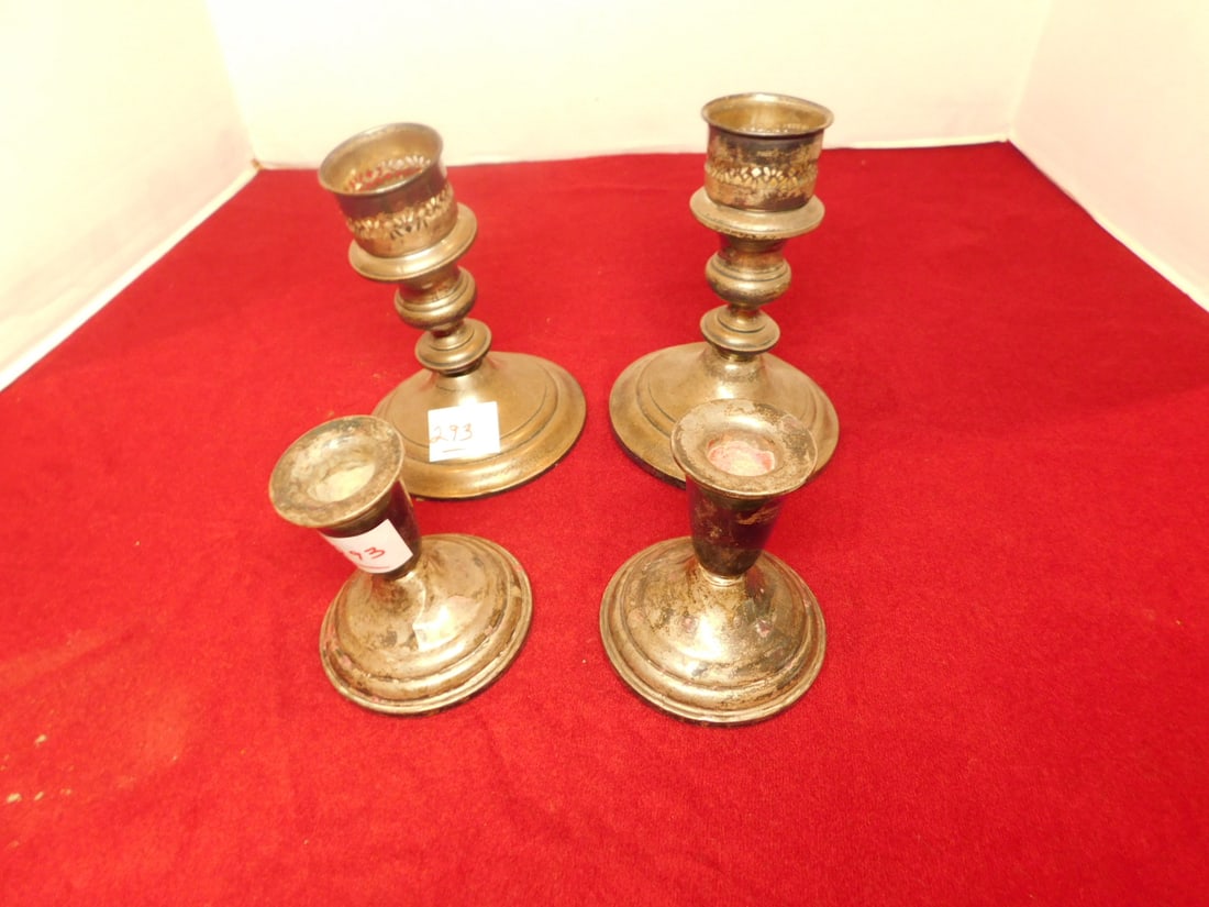 2 Pr Sterling Candlesticks: Two Pr Sterling Candlesticks, weighted; includes: 3 1/2"h and Gorham 5 3/4"h. CONDITION: Tarnished, both with bends.