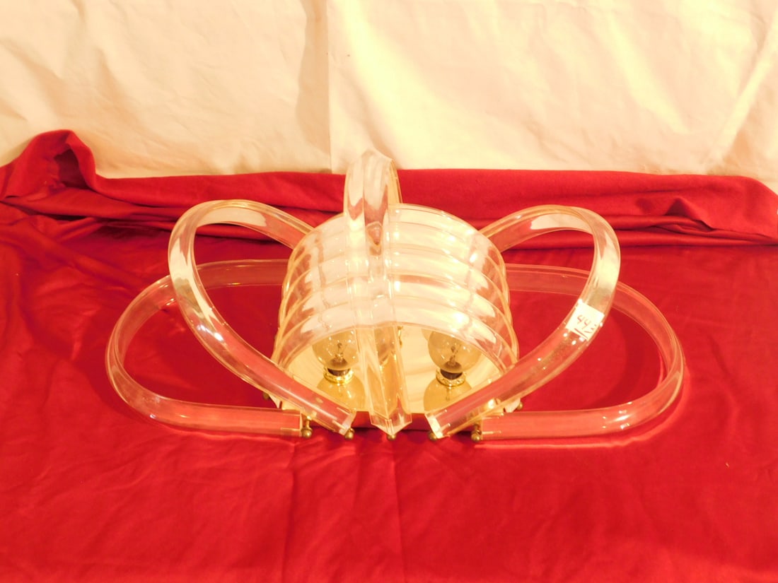 Lucite Chandelier: Lucite Chandelier ceiling mount, features 5 over 5 swivel lucite arches with brass joinerie on a chromed 4 light platform, circa 1960-70's, 10" x 10" x 9". CONDITION: very good