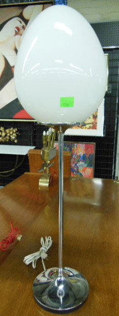 Design Line Stemlite Table Lamp: 1960's Design Line Inc. 31 1/2" Stemlite table lamp, chrome base with glass egg form shade. CONDITION: Minor wear on chrome.
