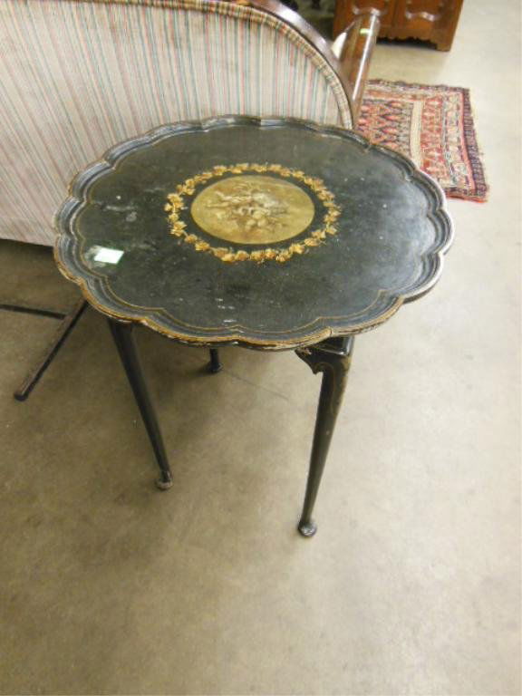 Decorator Neoclassical-Style Tea Table: Decorator black lacquer and stencil-gilt four-leg tea table, the pie-crust top with central hand-painted allegorical circular panel, early 20th C. 26 3/4" height. [Provenance: Estate of Winifred Dodge