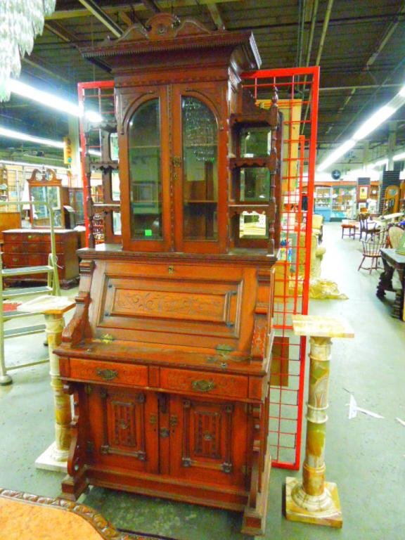 Fine Eastlake Secretary Desk and Cabinet: Fine Eastlake compact walnut secretary desk and cabinet, the display cabinet with open shelf units flanking twin arched panel doors, central deeply coved cornice above, the doors and mirrored back pan