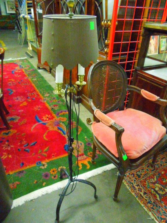 Pr, Decorator William & Mary-Style Floor Lamps: Pair, decorator William and Mary-style wrought iron and brass twin-light floor lamps with original simulated brass shades, early 20th C. 53" height (to tip of finial) [Provenance: Estate of Winifred D