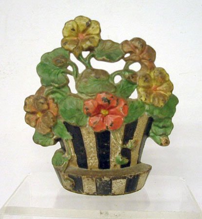 Hubley Cast Iron Nasturtiums Doorstop: Hubley Mfg. Co. painted cast iron #221 Nasturtiums 8" x 7" doorstop. CONDITION: Areas with wear & paint loss.