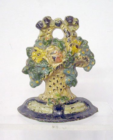 Hubley Cast Iron Flower Basket Doorstop: Hubley Mfg. Co. painted cast iron #108 Flower Basket 6" x 4 1/4" doorstop. CONDITION: Areas with wear, paint loss and rust.