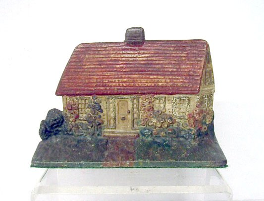 Albany Foundry Cast Iron Cottage Doorstop: Albany Foundry Co. painted cast iron #124 Cottage with Hollyhocks, 5 3/4" x 8 3/4" doorstop. CONDITION: Areas with wear, paint loss and rust.