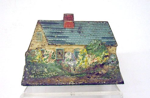 Eastern Specialty Cast Iron Cottage Doorstop: Eastern Specialty Mfg. Co. painted cast iron Cottage 5 3/4" x 8 3/4" doorstop. CONDITION: Areas with wear, paint loss and rust.