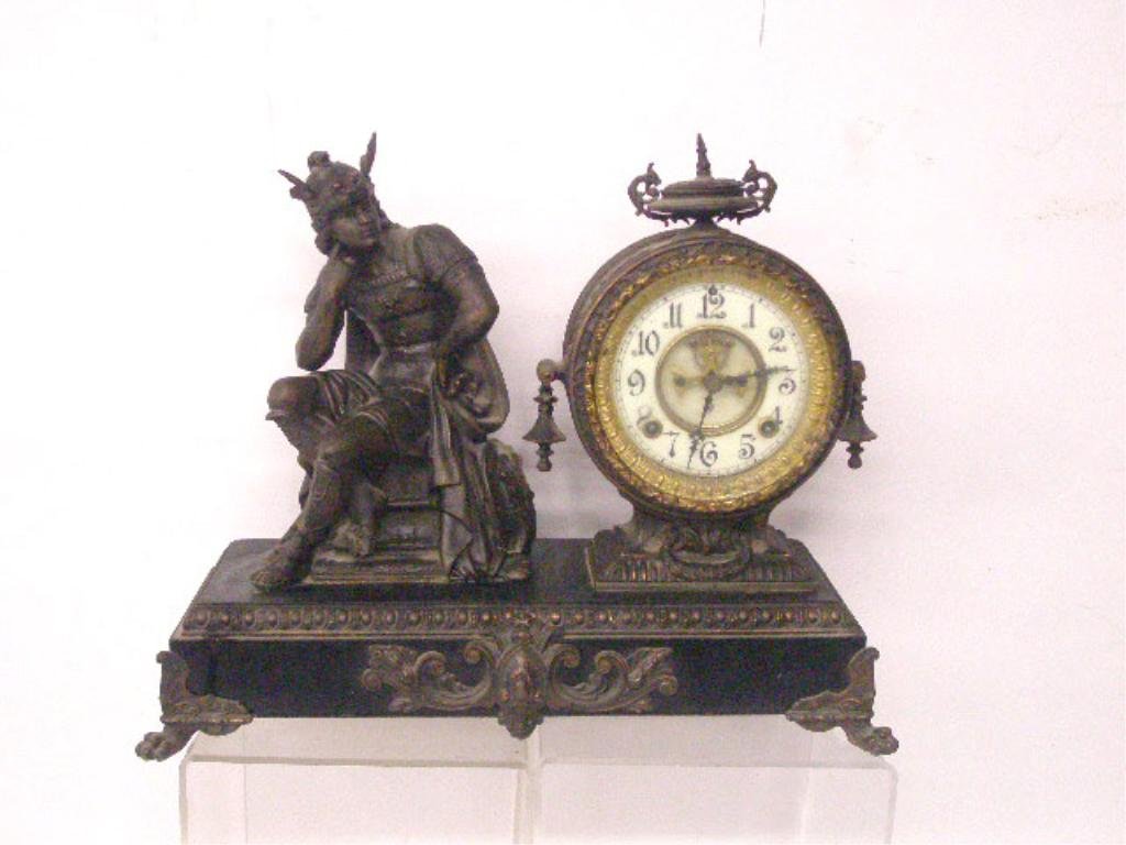 19th c. Ansonia Mercury Mantle Clock: 19th c. Ansonia Clock Co. figural cast metal "Mercury" mantle clock, 13 1/2" x 16" x 5 3/4", time & strike movement, porcelain dial, cast hands, spelter base, open escapement. CONDITION: Not working, 