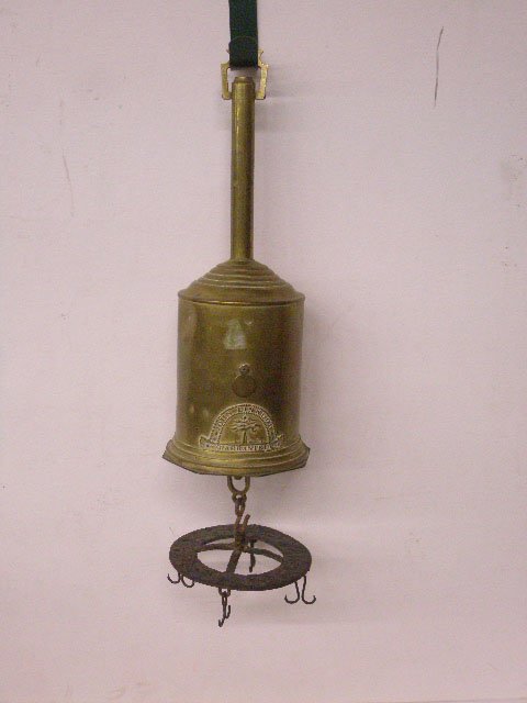 19th c. English Bottle Jack Spit Roaster: 19th c. John Linwood English brass & forged iron 17" Bottle Jack spit roaster with clockwork mechanism. CONDITION: Not know if mechanism works, areas with wear & dents from usage.