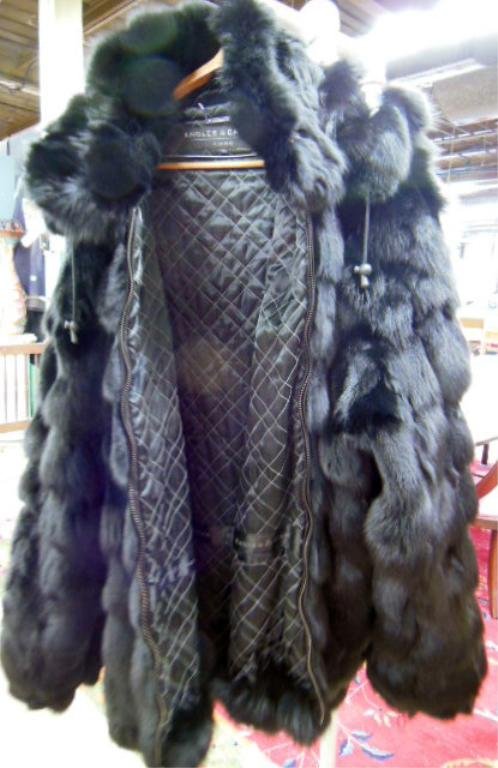 Man's Black Fox Fur Jacket: Man's black fox fur jacket, Knoles and Carter, luxe, size 7x, hooded, quilted lining, inside zippered pockets. CONDITION: Very good.