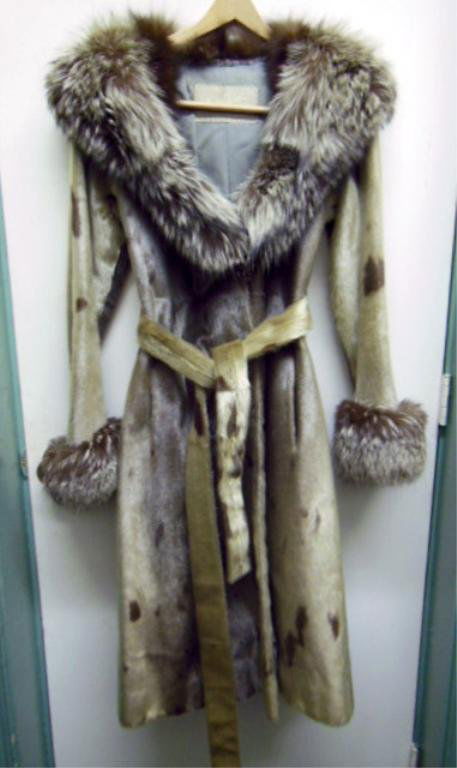Donald Brooks Hair Seal Lady's Coat: Donald Brooks hair seal coat, spotted seal with silver fox collar, cuffs and belt, made for Nan Duskin, Phila. 1960's. 42" neck to hem, 25" sleeve length, approximately 34" waist, size unknown, "Susie