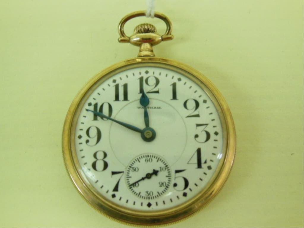 Waltham GF Pocket Watch: Early 20th C. Waltham Watch Co. gold filled open face pocket watch with screw back, engine turned and floral chaised design, five positions, 23 jewels, 30mm movement. [496] CONDITION: Minor wear, curr
