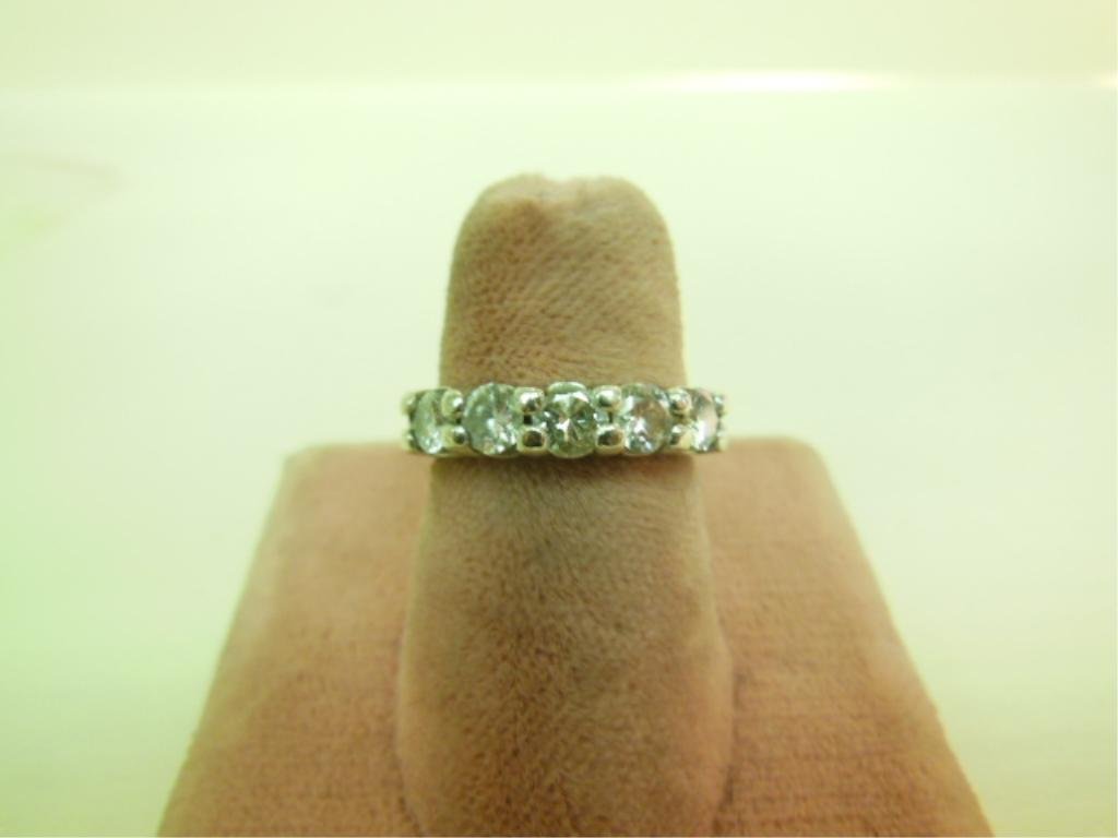 14k & Diamond Lady's Wedding Band: Lady's diamond wedding band, 14k white gold with five round modern cut diamonds approximately 1 ct+ total weight, DWT, size 5 1/4. [8] CONDITION: Good, normal wear.