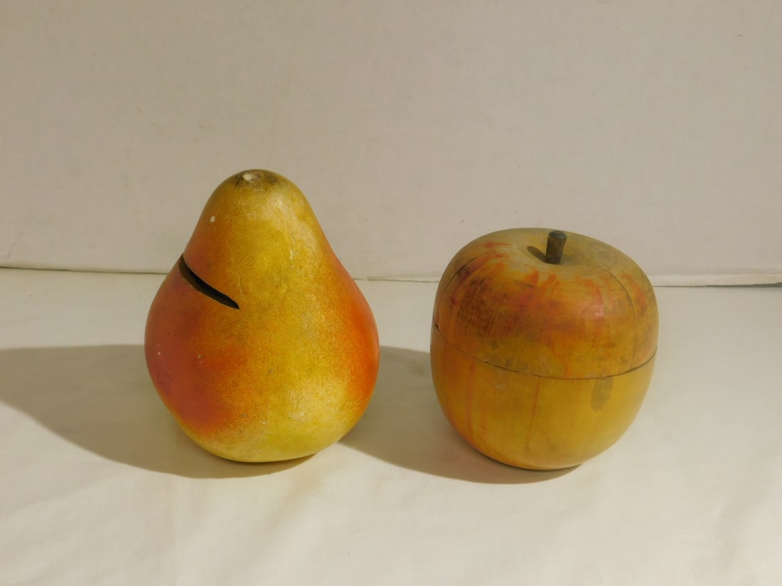 Fruit Form Container & Bank: Fruit Form Container and Bank, including: wood apple form container, Patent No. 36406, 4"d x 4 1/8"h (including stem), plus plaster pair form bank, 4 1/4"d x 5 3/8"h. CONDITION: Wood split on apple li