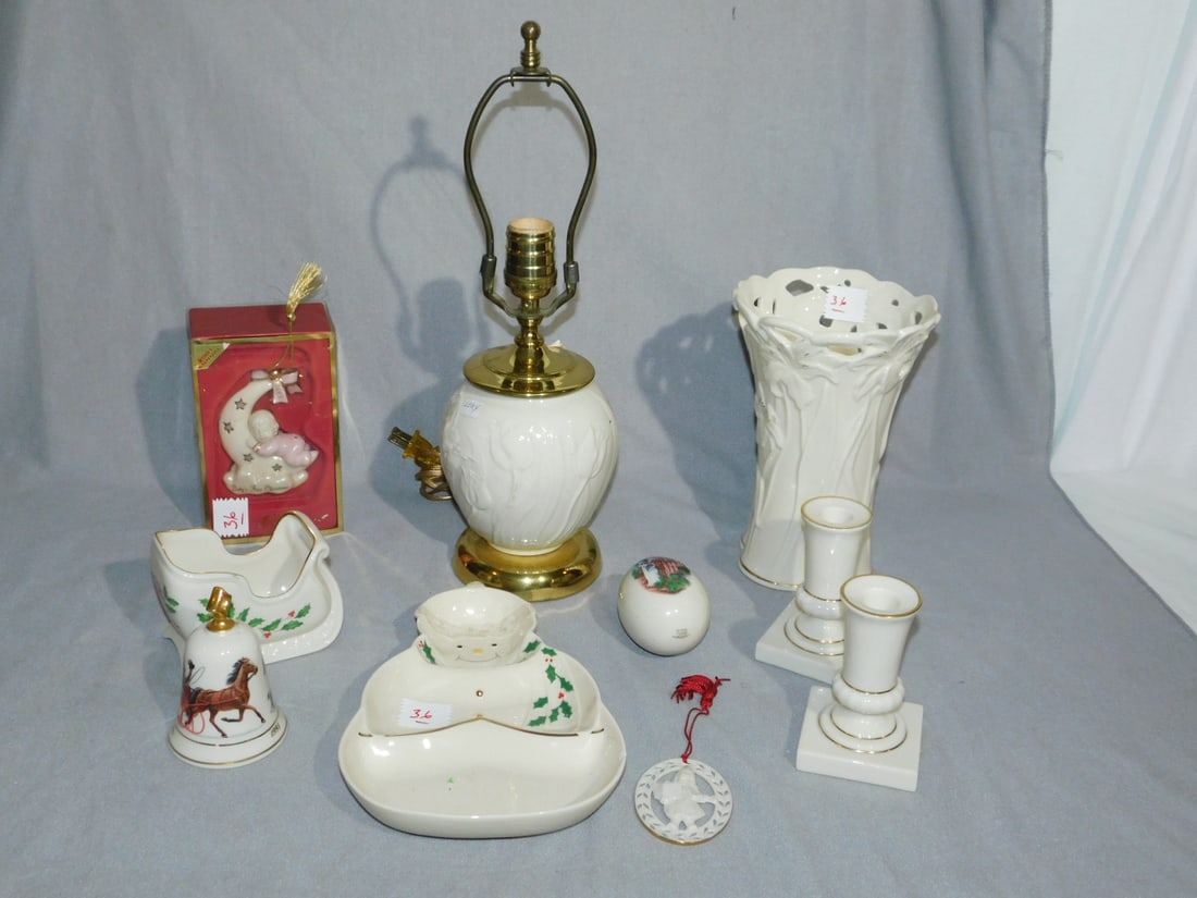 10 Lenox Pieces: Ten Lenox Pieces, porcelain, includes: 11" lamp, 2001 Ltd. Ed Mother's Day 8 3/4" vase, a pair of 4 1/2" candlesticks, 1994 egg, snowman dish, 1993 bell, sleigh and two Christmas ornaments. CONDITION: