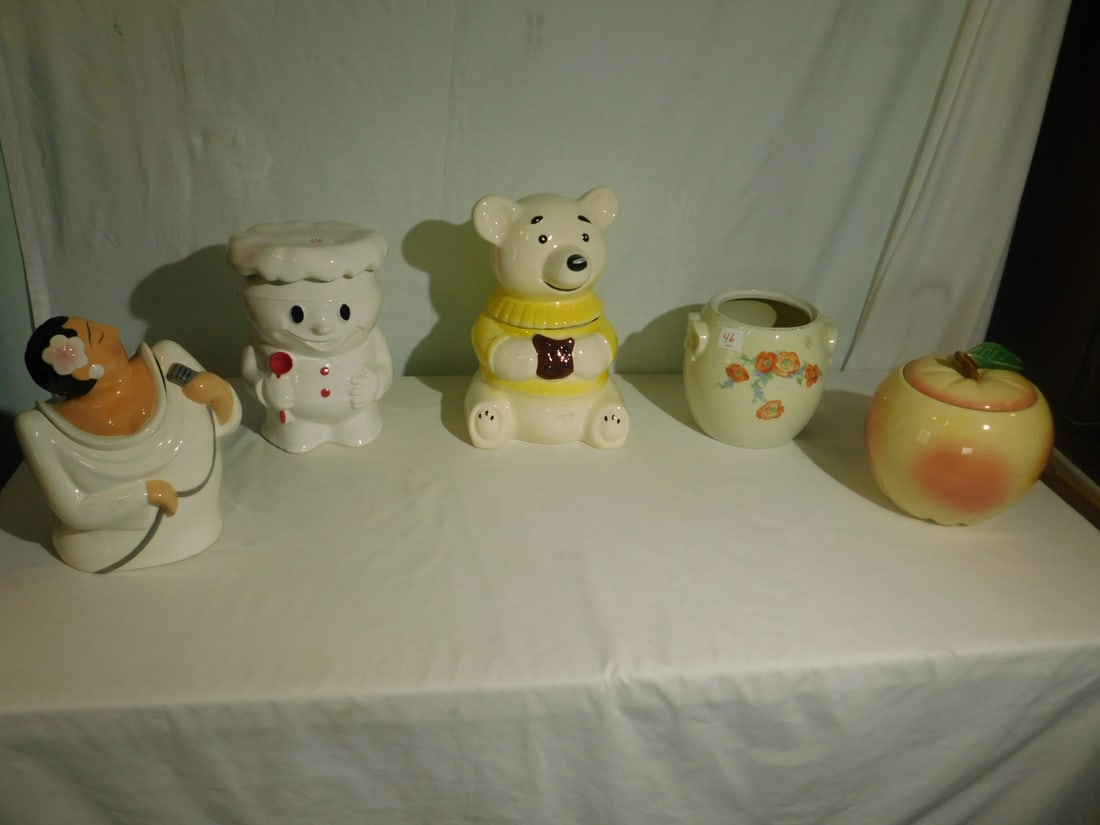 5 Ceramic Cookie Jars: Five Ceramic Cookie Jars, includes: Lady Singer by Clay Art Jazz, 9 1/2"h, unmarked apple form, McCoy Chef, an unmarked teddy bear, 12"h and a Hall's floral (no lid). CONDITION: Very good - used.