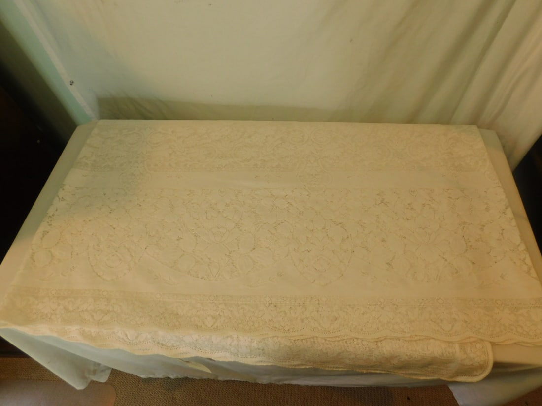 Large Lace Table Cover: Large Lace Table Cover, white Quaker Lace style, 154" x 72", floral open work design. CONDITION: Very good. No issues identified.