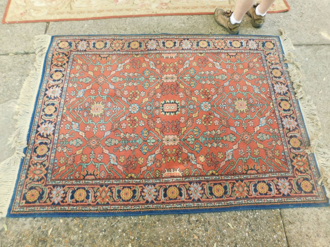 Karastan Area Rug: Karastan Area Rug, Seropi pattern in rust, blues and yellow, mid 20th C, 4'3" x 6'. CONDITION: Very good.