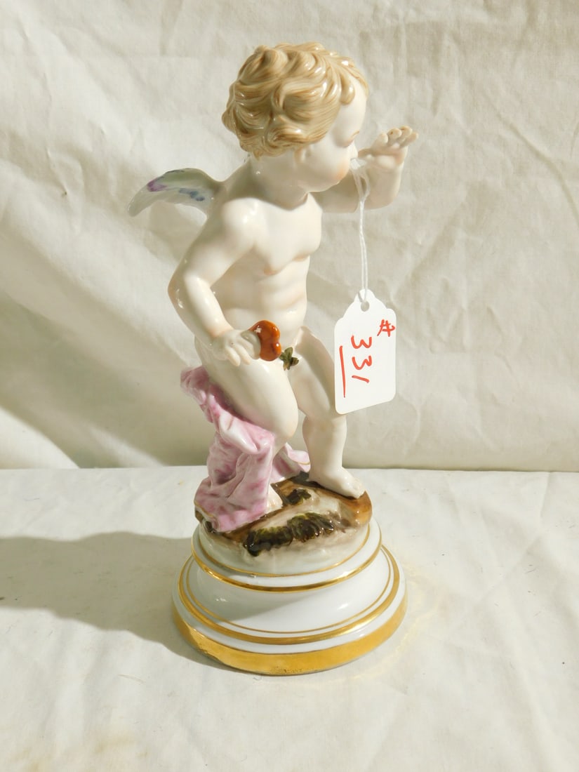 Meissen Type Putti: Meissen Type Putti, fine porcelain, standing winged angel holding a heart, blue underglaze mark, early 20th C, 8 1/4". CONDITION: Very fine