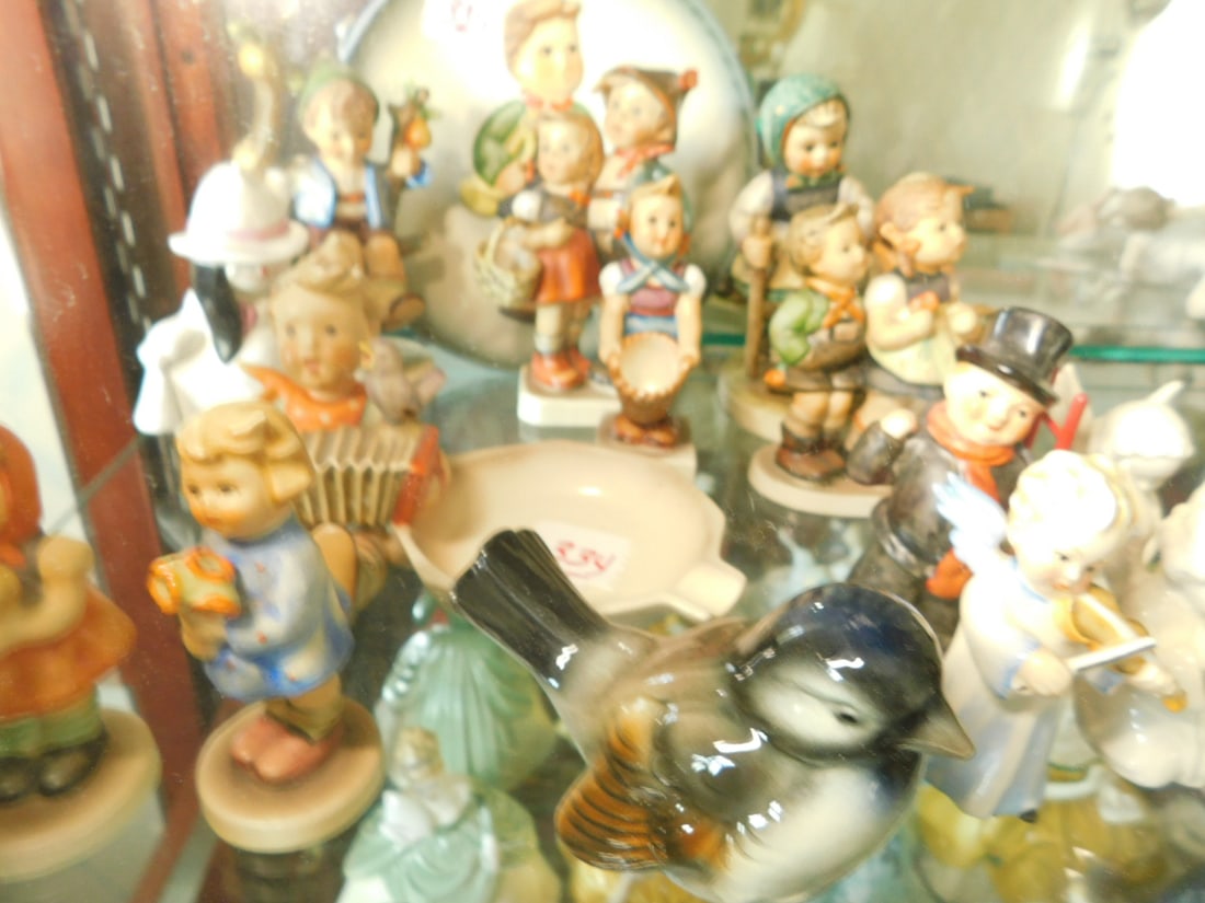 Goebel Figures: Goebel Figures, includes: eight Hammel figures, full bee, stylized and current marks, from 3 1/4" to 5 3/4"h; Schmidt 1984 plate; plus six Goebel angels, figures and bird. CONDITION: Very good.