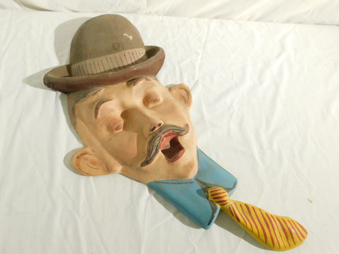 Paper Mache Head Plaque: Paper Mache Head Plaque wall hanging, vintage barber shop singed with bowler hat, mustache and tie, hand painted, 24 1/2"h. CONDITION: Small area of paint loss and chipping on hat, other wise very min