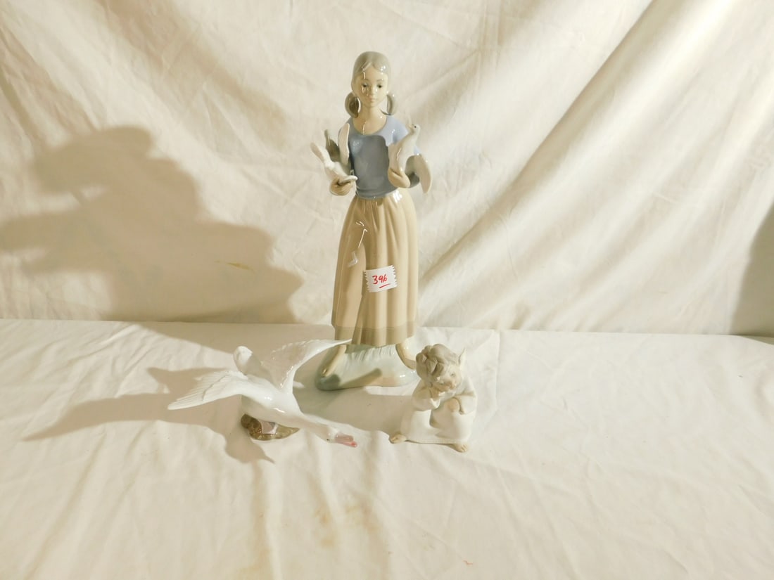 Lladro & Other Figures: Lladro and Other Figures, including: Lladro sitting Angel (matte finish), 4 1/4", one unmarked Lladro type flying duck (gloss finish), 7"l and one Zaphin (Spain) girl with birds figure (gloss finish),