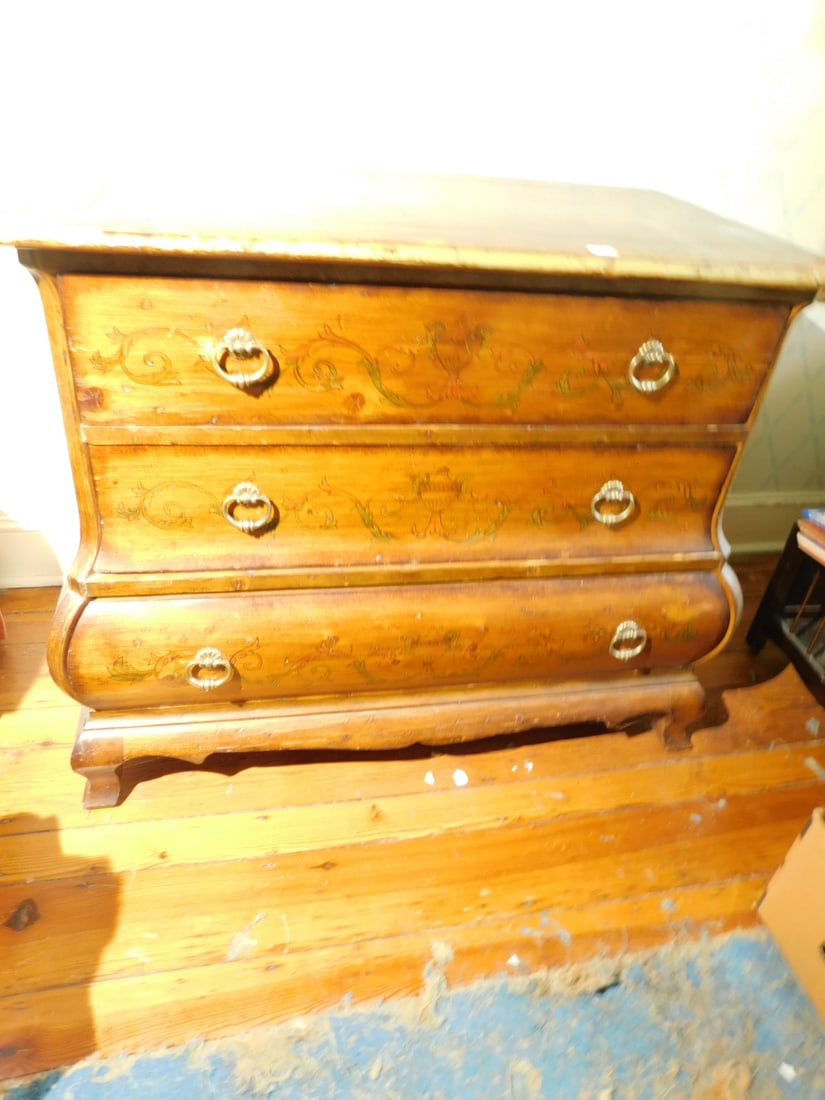 Continental Bombay Dresser: Continental Bombay Dresser, pine with painted urn and scroll on fronts of three drawers with pendant brasses, ogee bracket feet, mid 20th C, 42" x 35" x 24". CONDITION: Expansion splits, finish spotti