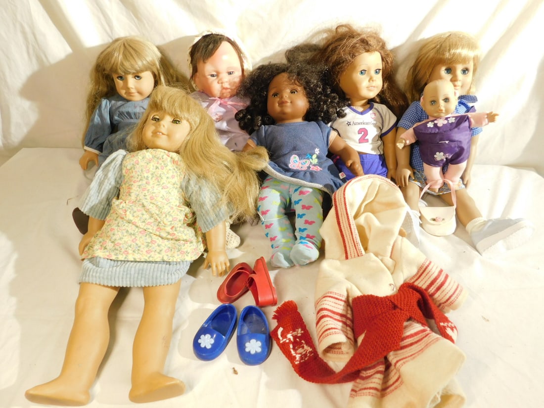 American Girl & Other Dolls: American Girl and Other Dolls, including: American Girl Bitty baby and three others, one Battat doll, 17" with baby in backpack, one Linda Murray 16" doll. CONDITION: Good, may have minor wear.
