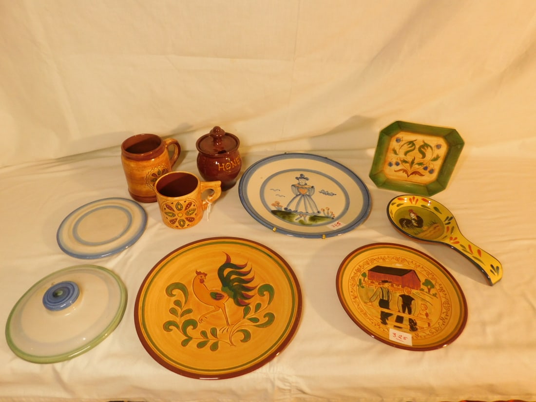 Pottery Group: Pottery Group, includes: Pennsbury Pottery 8" and 10" plates and two mugs; M.A. Hadley 11" plate, 6 1/4" trivet and 6 3/4" lid, plus a Kohler signed honey pot. Pennsbury wall pocket and "Provence roos
