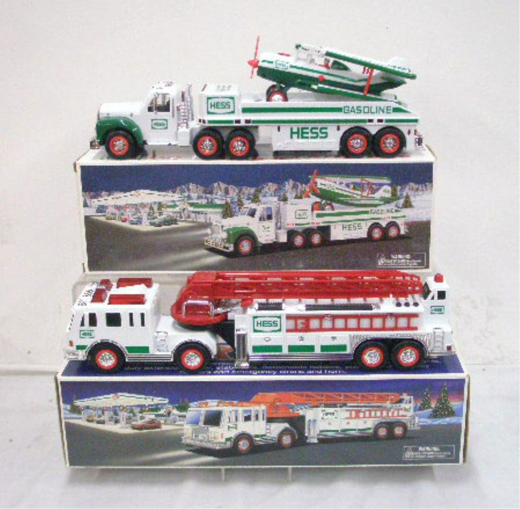 2000 & 2002 Hess Fire & Airplane Trucks: 2000 & 2002 Amerada Hess Corporation battery operated fire truck and toy truck and airplane with boxes. CONDITION: Both have working functions and are very good with no damage, boxes have wear.