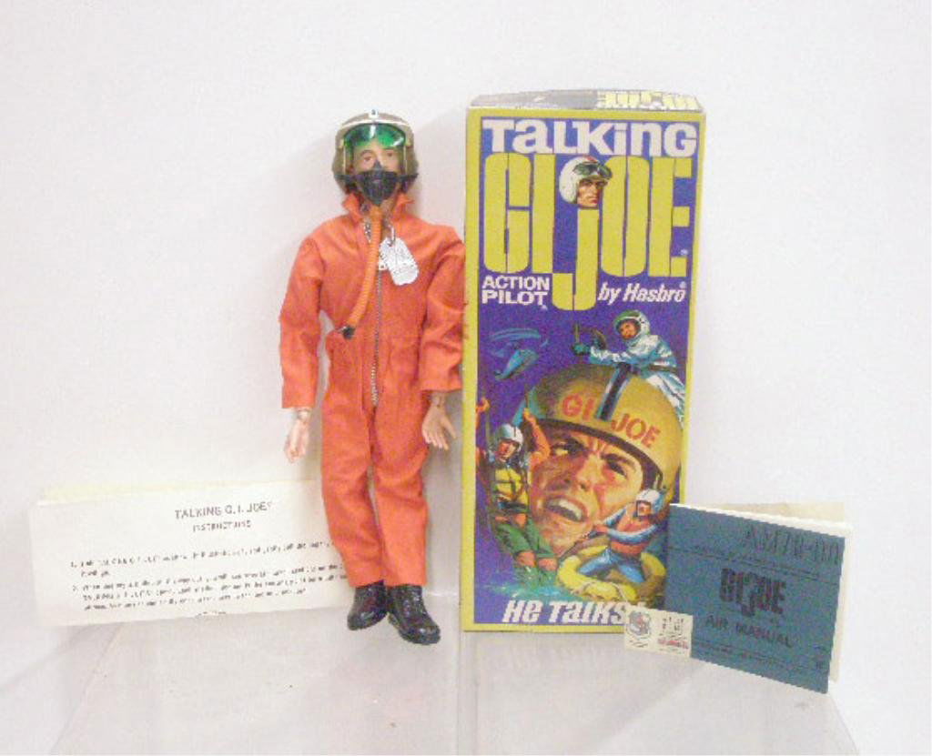 1967 Talking G.I. Joe Action Pilot Doll: 1967 Hasbro Industries Inc. Talking G.I. Joe Action Pilot doll with original box. CONDITION: Very good with detached right arm, voice box works, box has wear.