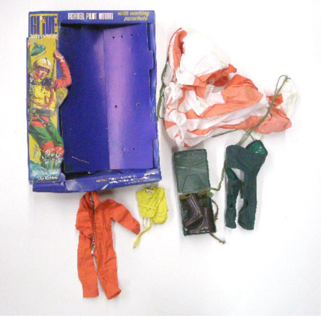 1967 G.I. Joe Fighter Pilot Outfit: 1967 Hasbro Industries Inc. G.I. Joe Action Pilot Fighter Pilot outfit with working parachute, with box. CONDITION: Appears to be complete, outfit has minor wear, box has wear and tearing.