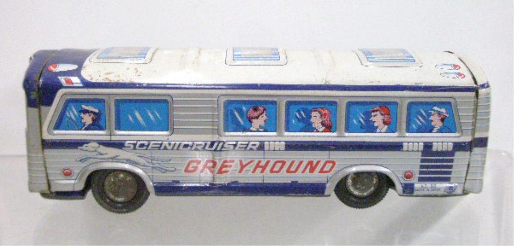 1960's Japanese Tin Friction Greyhound Bus: 1960's Japanese lithographed tin friction Scenic Cruiser Greyhound bus. CONDITION: Friction portion works, areas with wear, loss and rust.
