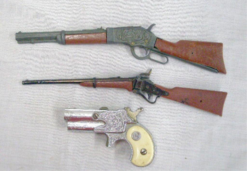 Vintage Toy Cap Pistol & Rifles: 1950's Nichols Dyna-Mite & 1960's Hubley toy cap pistol & rifles. CONDITION: All have some form of wear, 1 rifle has cracks & loss on grips.