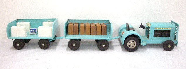 1960's Tonka Toys Luggage Carrier: 1960's Tonka Toys pressed steel Tonka Airlines Luggage Carrier with 11 plastic suitcases. CONDITION: Areas with wear & loss, missing 1 metal bar that holds suitcases.