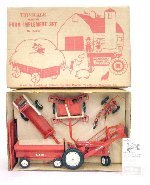 1960's Tru-Scale Master Farm Implement Set: 1960's Tru-Scale Machine Co. pressed steel No. 6-530 Master Farm Implement set with box. CONDITION: Very good with areas of minor wear & or loss on a couple of pieces, box has minor wear.