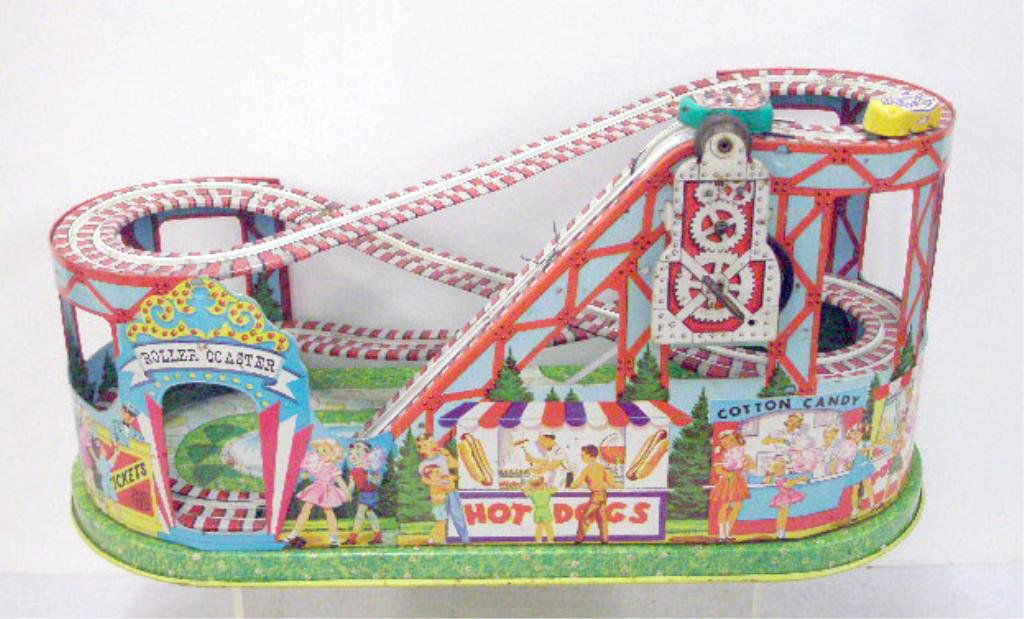 1950's Chein Tin Wind Up Roller Coaster: 1950's J. Chein & Co. lithographed tin wind up roller coaster with cars & 2 extra belts. CONDITION: Works but cars do not connect properly to metal latch on belt, areas with wear & rust.