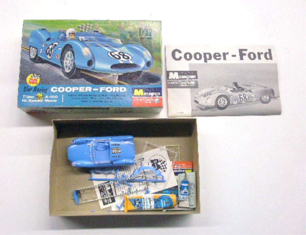 1964 Monogram Cooper-Ford Car Model Kit: 1964 Monogram Models Inc. Cooper-Ford modified sports racing car 1/32 scale model kit with box. CONDITION: Assembled with minor wear, box has wear.