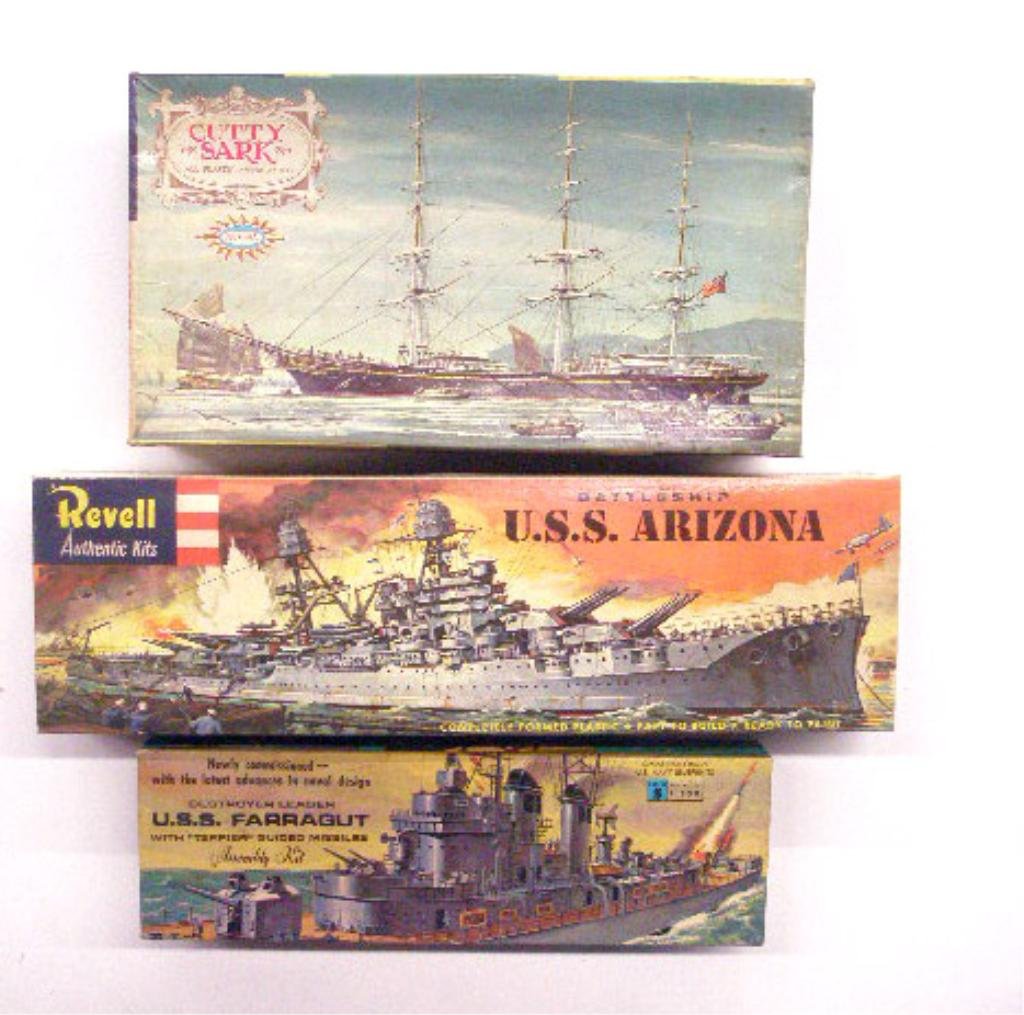 1960's Ship Model Kits: Three 1960's ship model kits with boxes, Aurora Plastics Corporation Cutty Sark, Renwal Products Inc. U.S.S. Farragut (1/500 scale) and Revell Inc. Battleship U.S.S. Arizona. CONDITION: Cutty Sark is 